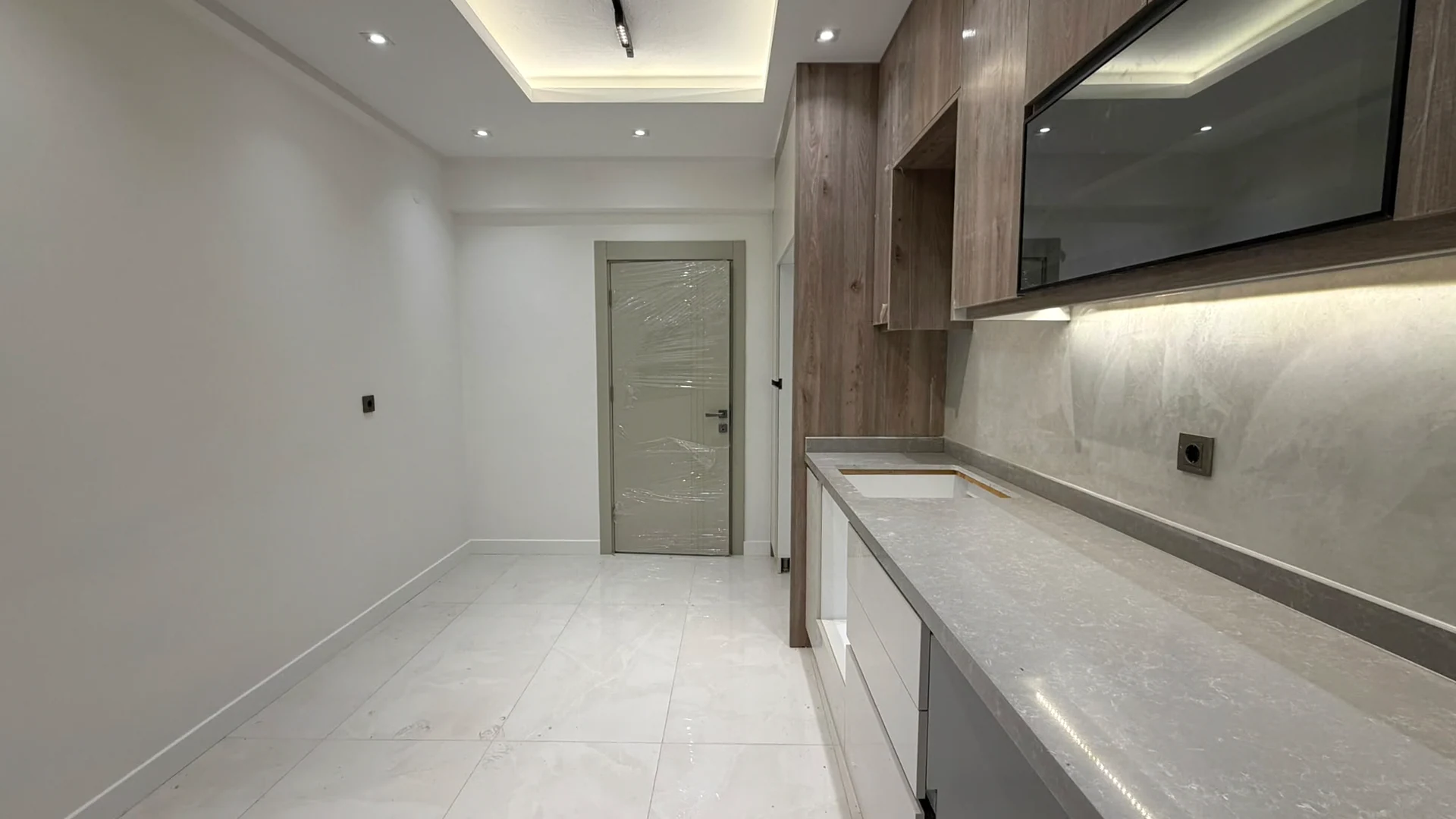 Cabinets, countertop and circulation space in the separate kitchen