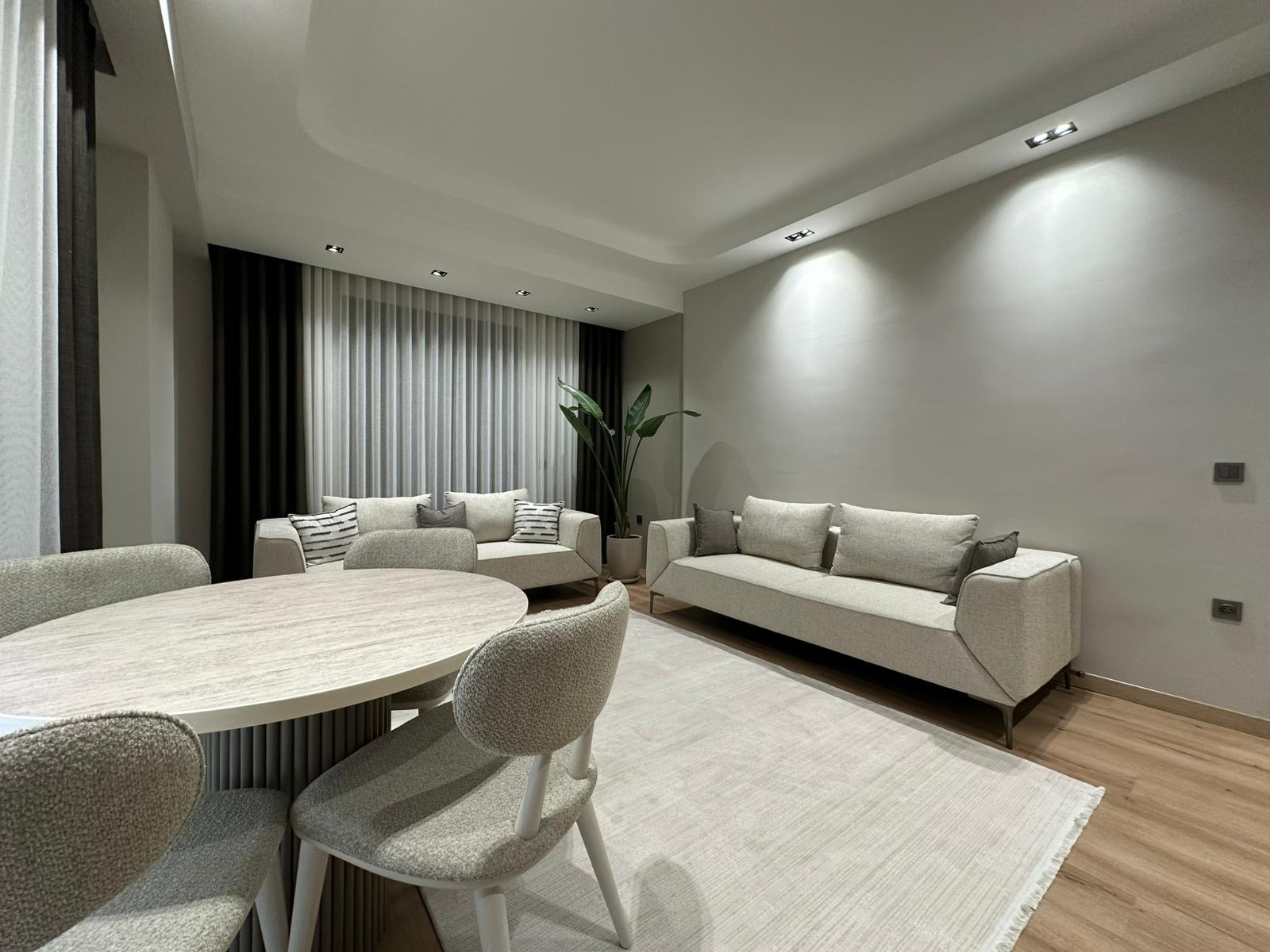 Living and dining area · Show apartment photographs