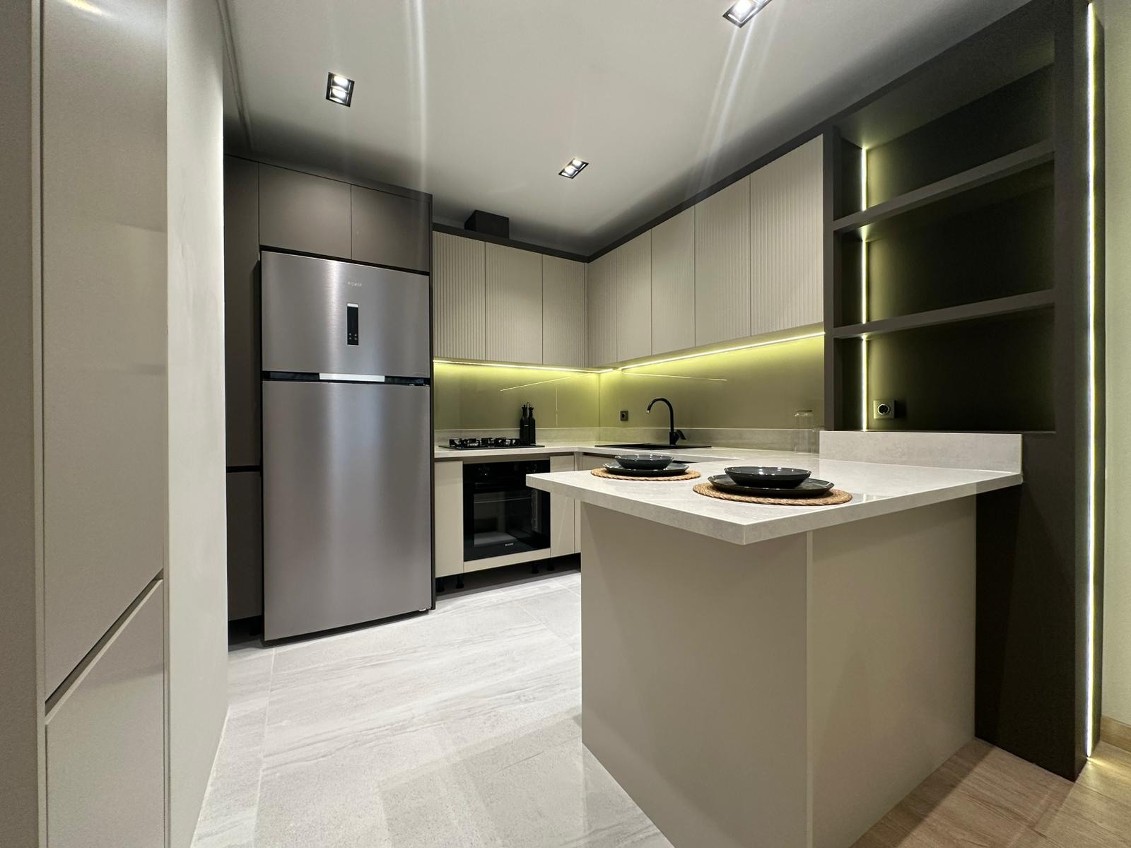Kitchen and counter · Show apartment photographs